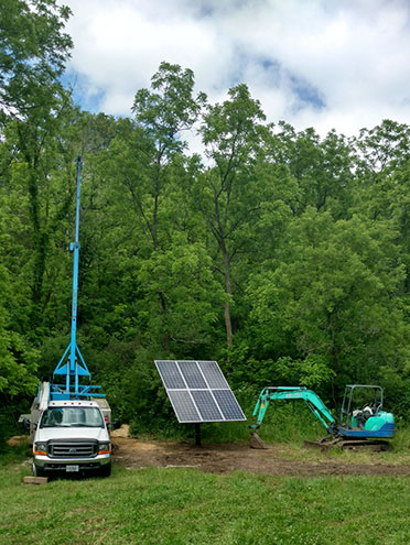 Well Pros truck and solar panel